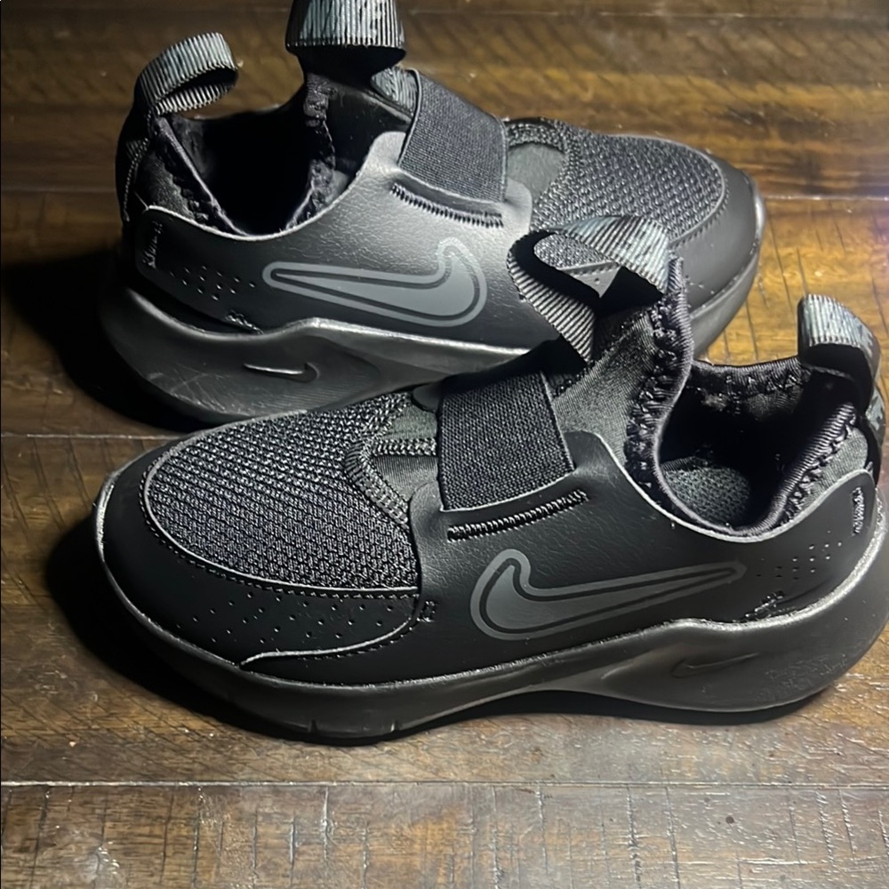 Nike Black Sneakers with Mesh Upper and Cushioned Midsole